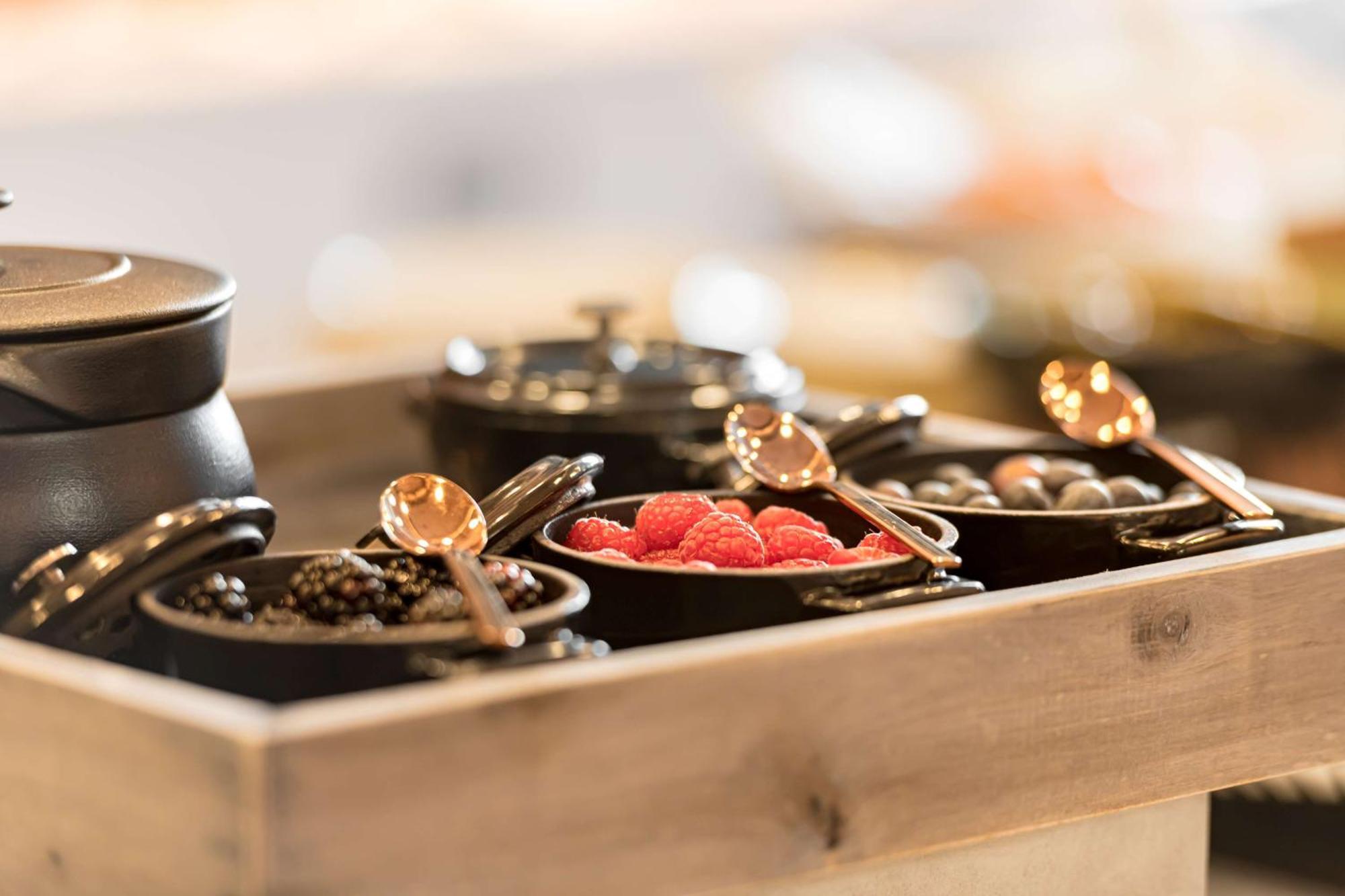 Radisson Blu Hotel Riyadh Convention And Exhibition Center Exterior photo Caviar and other garnishes at a restaurant