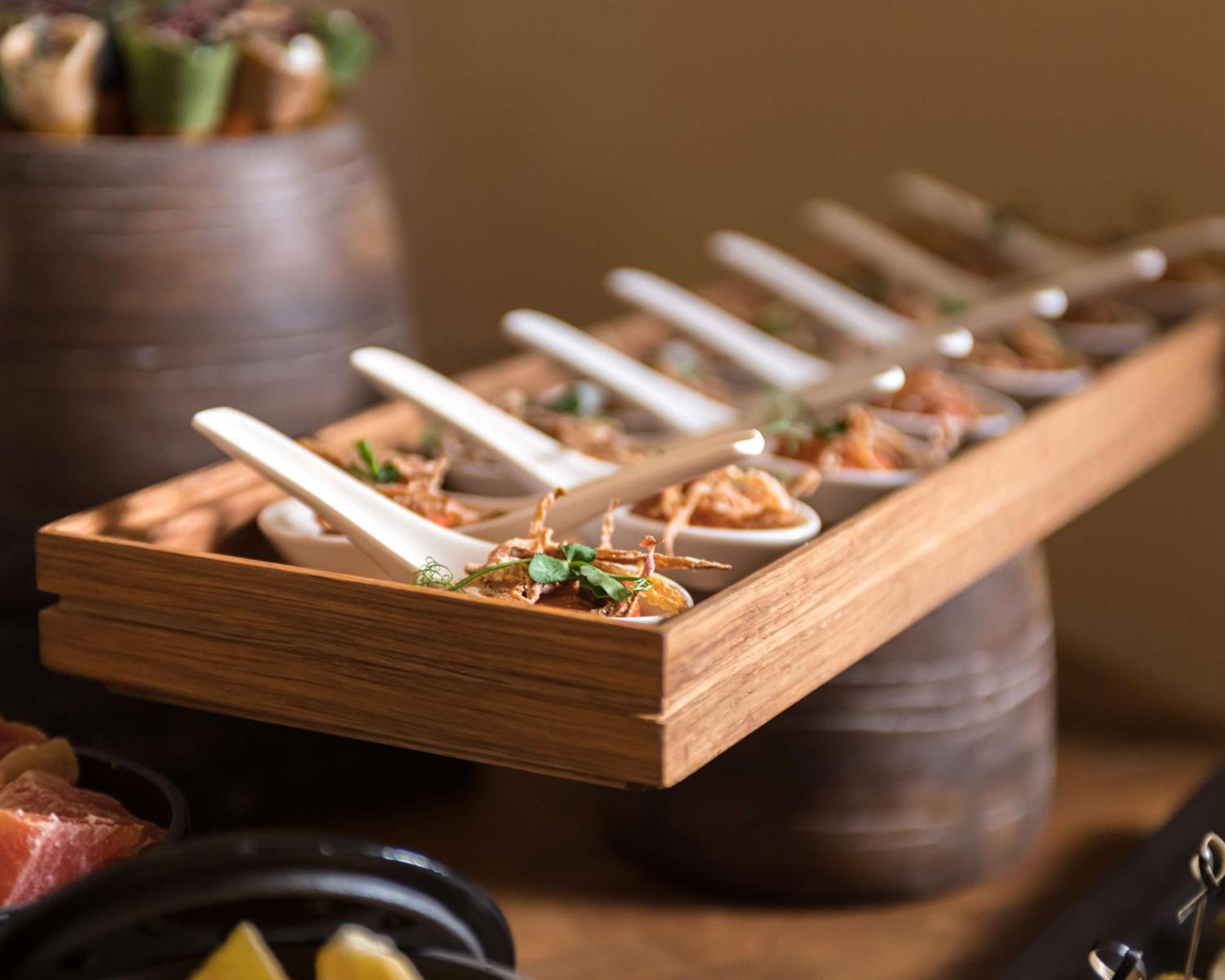Radisson Blu Hotel Riyadh Convention And Exhibition Center Exterior photo A selection of tapas