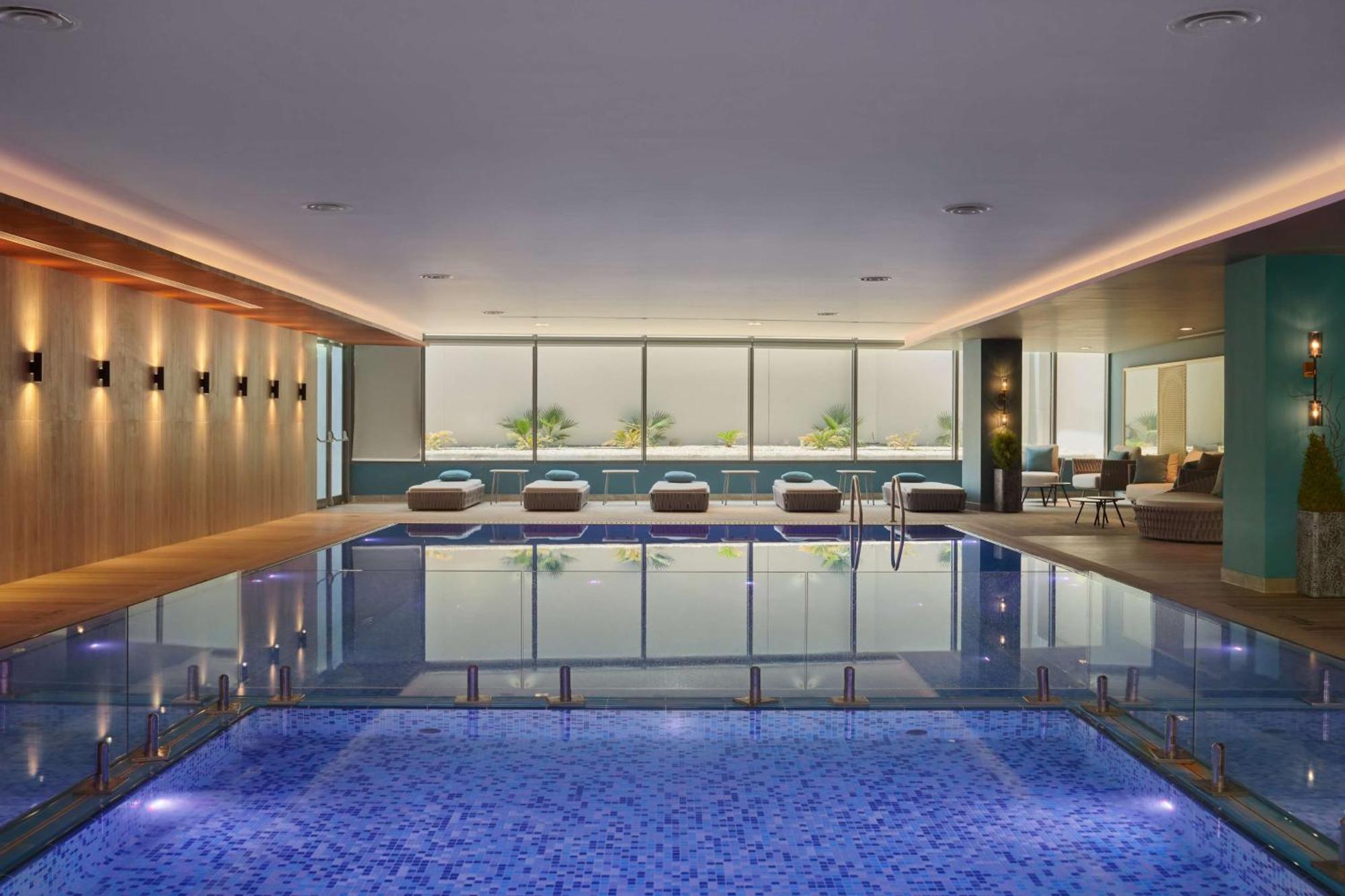 Radisson Blu Hotel Riyadh Convention And Exhibition Center Exterior photo The swimming pool at The Dorchester